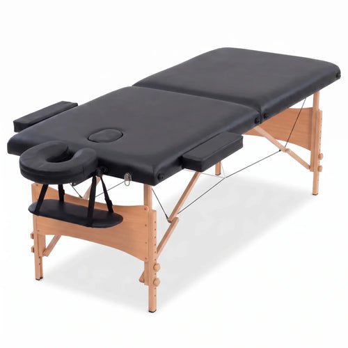 Table de massage en bois pliable ouverte avec têtière réglable et accoudoirs latéraux, vue trois quarts - Le Bon Massage